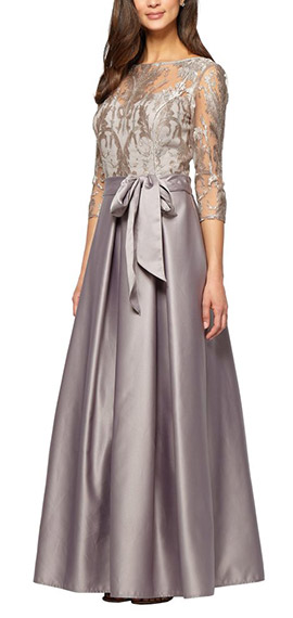 long stretch tulle ball gown from alex evenings with embroidered bodice and attached tie belt.