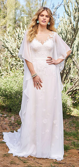 a-line wedding dress from justin alexander with sheer lace draped around arms