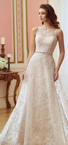 ivory a-line bridal gown from david tutera for mon cheri with embroidered schiffli lace over satin and a beaded belt at natural waist
