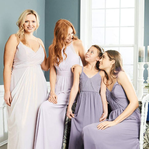 bridesmaids of all ages wearing different dresses